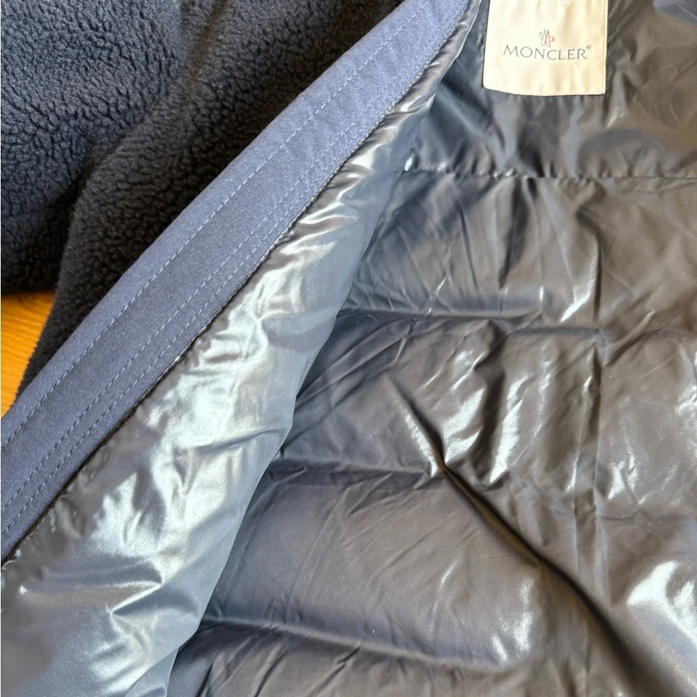 Moncler Boys down Jacket with shearling detail on the front, size 10.